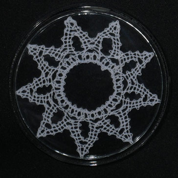 Dessous de bouteille étoile blanche